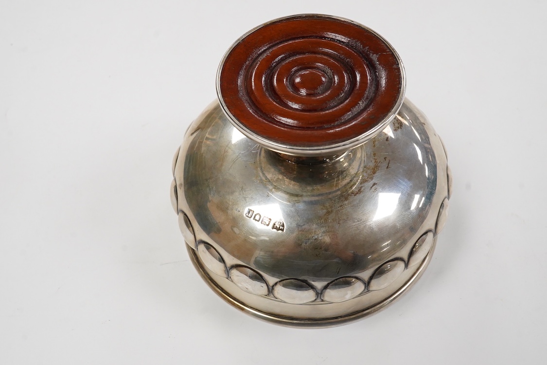 A George V silver pedestal bowl, with dimpled body, Maxfield & Sons Ltd, London, 1912, diameter 11.5cm, weighted, gross 6.1oz.